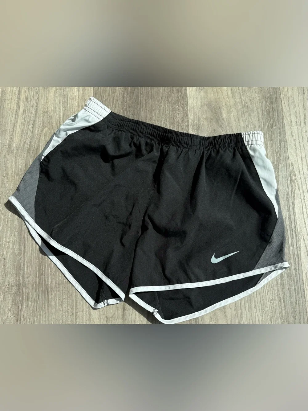 Nike Black Athletic Shorts with White Trim and Swoosh Accent, 3” inseam